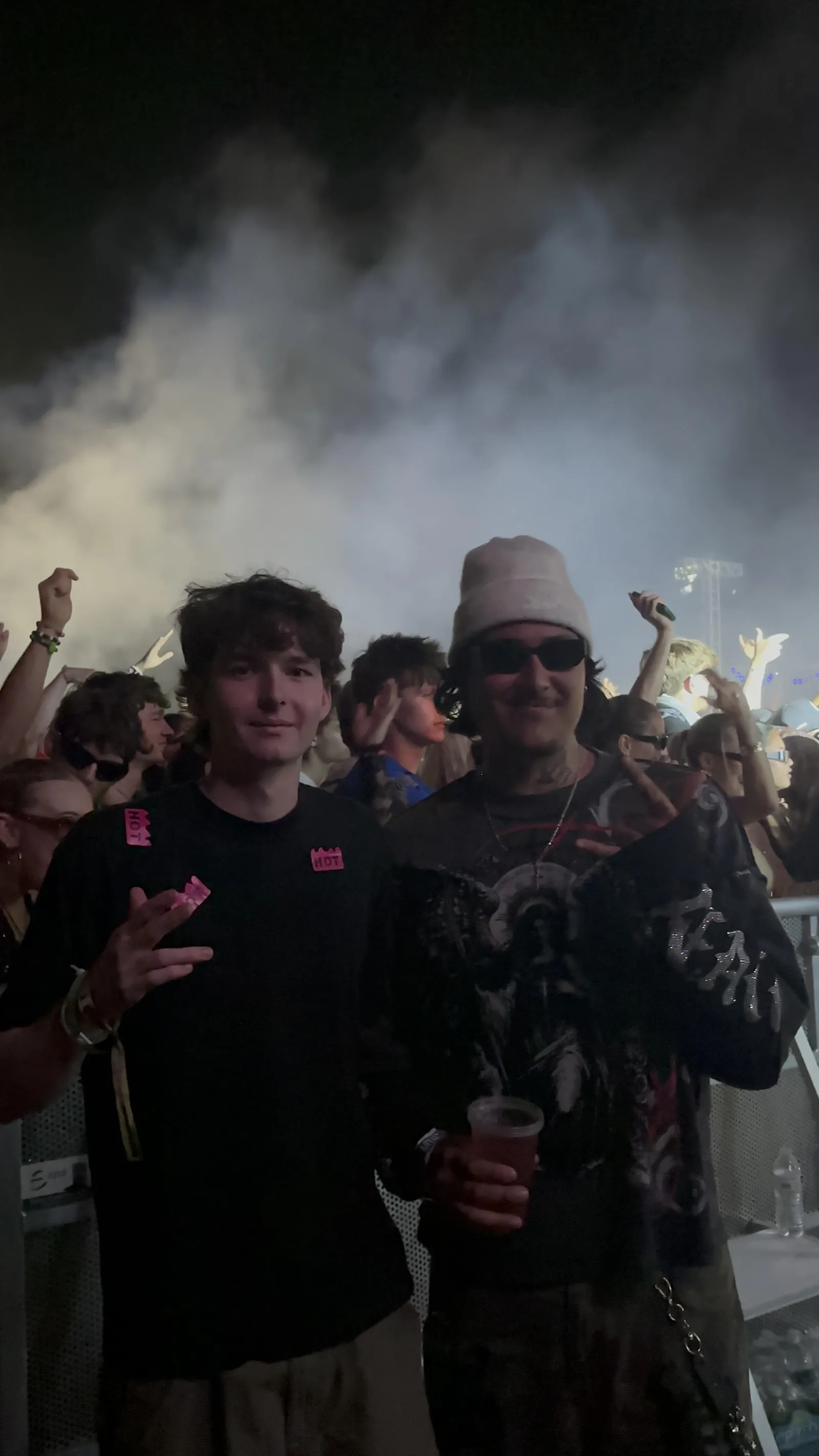 Keenan in the festival crowd beneath the stage lights